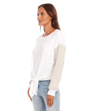 Load image into Gallery viewer, This beautifully crafted top combines effortless style with sustainability, made from a luxurious blend of hemp and cotton. Designed with contrasting sleeves for added flair, it features a chic tie-front detail that adds a modern touch to its classic silhouette. Lightweight and breathable, this versatile top is perfect for any occasion, from casual outings to more polished events.