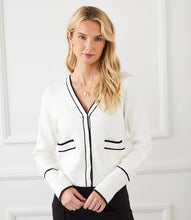 Load image into Gallery viewer, This versatile cardigan effortlessly blends both comfort and elegance with its contrasting trim and convenient patch pockets. Ideal for a casual day out or a polished office look, this essential layering piece adds a touch of sophistication to any ensemble.