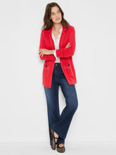 Load image into Gallery viewer, Woman wearing a red blazer over a white shirt, blue jeans and flats against a light gray background.