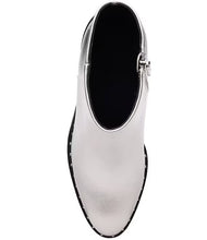 Load image into Gallery viewer, Make a fashion statement with these round-toe ankle boots. Adorned with a dazzling silver metallic color, studded detailing, and a robust stiletto heel, these boots add a dash of urban elegance and individual flair to any outfit.