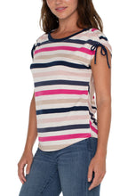 Load image into Gallery viewer, This dolman tee is a classic with a twist! Bold stripes and adjustable shoulder ties give it a stylish upgrade. Our super soft poly blend makes this crew neck tee perfect for dressing up or down. It's anything but basic!