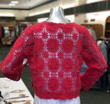 Load image into Gallery viewer, Crafted with precision, this white crochet cardigan from EsQualo boasts a delicate openwork pattern, complemented by oversized buttons and a flattering v-neck design. A must-have for spring and summer, it effortlessly elevates any ensemble with its refined charm and cozy feel. Whether you're basking in the warm sun or embracing a cool evening breeze, this versatile piece exudes sophistication and comfort.