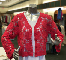 Load image into Gallery viewer, Crafted with precision, this white crochet cardigan from EsQualo boasts a delicate openwork pattern, complemented by oversized buttons and a flattering v-neck design. A must-have for spring and summer, it effortlessly elevates any ensemble with its refined charm and cozy feel. Whether you're basking in the warm sun or embracing a cool evening breeze, this versatile piece exudes sophistication and comfort.