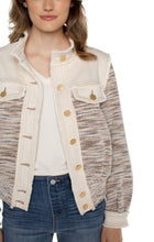 Load image into Gallery viewer, This jacket showcases a stunning combination of slight fray denim and boucle knit. The blend of textures, complemented by the earthy hues and gold metallic accents, creates a distinctive and adaptable garment that will surely be a go-to choice for your wardrobe. Color- Ecru Multi Boucle. 23-1/2" HPS. Gold button-front closure. Button cuffs. Two front flap pockets. Side welt pockets. Mixture of denim and boucle. Fray details at the seams.