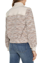 Load image into Gallery viewer, This jacket showcases a stunning combination of slight fray denim and boucle knit. The blend of textures, complemented by the earthy hues and gold metallic accents, creates a distinctive and adaptable garment that will surely be a go-to choice for your wardrobe. Color- Ecru Multi Boucle. 23-1/2" HPS. Gold button-front closure. Button cuffs. Two front flap pockets. Side welt pockets. Mixture of denim and boucle. Fray details at the seams.