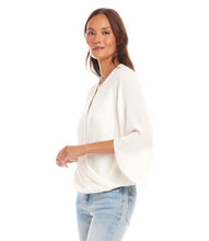 Load image into Gallery viewer, This sophisticated Drape Front Crossover Top is ideal for both professional and casual settings. Made with silky crepe material, it drapes elegantly and complements any silhouette. The crossover hem adds an element of flowing refinement, making it suitable for transitioning from day to evening wear.