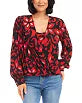 Load image into Gallery viewer, This Karen Kane top features a stylish crossover neck design and blouson sleeves. Made from high-quality fabric, it offers a relaxed fit and pullover style, perfect for both casual and formal occasions. The allover print adds a touch of elegance, making it a versatile addition to any wardrobe.