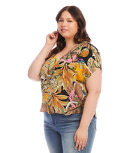 Load image into Gallery viewer, Expertly crafted from luxurious cupro fabric, this top combines tropical charm with a relaxed sophistication. The Dolman sleeves add a touch of casual elegance, creating a comfortable and laid-back fit that effortlessly complements your style. With its vibrant and breezy design, this top is perfect for any occasion.