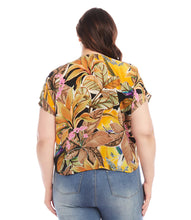 Load image into Gallery viewer, Expertly crafted from luxurious cupro fabric, this top combines tropical charm with a relaxed sophistication. The Dolman sleeves add a touch of casual elegance, creating a comfortable and laid-back fit that effortlessly complements your style. With its vibrant and breezy design, this top is perfect for any occasion.