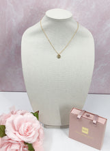 Load image into Gallery viewer, Perfect to wear alone or layer with other necklaces, this gorgeous Darcy vintage Louis Vuitton button on a shiny gold chain necklace will quickly become your go to. Perfect sparkle on our Darcy will catch the eye of admirers.