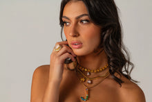 Load image into Gallery viewer, This dazzling Dariana Ring is sure to turn heads and add a special spark to your outfit. Crafted in Canada with high-grade crystal elements and gold-plated base, it's designed for a perfect fit. Put the finishing touch on your look with this must-have accessory! Color- Beige. High quality crystals. Gold plating over brass. One size, adjustable.