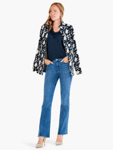 Load image into Gallery viewer, Introducing our latest must-have: the lace camisole. Its design is sleek, its structure impeccable, and its material ultra-soft. It is thoughtfully designed with convenient, bra-friendly straps to simplify your routine. The delicate, feminine lace trim at the v-neckline makes it perfect for layering under any outfit. It's the subtle touch of lace that enhances every ensemble, making it our go-to piece under sweaters, cardigans, and jackets this season.