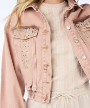 Load image into Gallery viewer, This uniquely designed jean jacket is sure to turn heads. Its intricate embroidery adds a touch of femininity to the cool outerwear. Each embroidery features bronze crystals for extra shine.