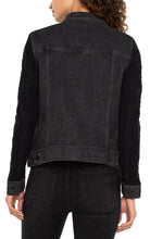 Load image into Gallery viewer, This jacket offers a contemporary twist on a classic design, blending the durable charm of denim with the snug comfort of knitwear. It boasts a button-front closure, a pointed collar, and chest pockets, all within a timeless silhouette. The contrasting knit sleeves provide a distinctive flair. Made from a soft, textured knit, the sleeves ensure both comfort and fashion, setting this jacket apart.