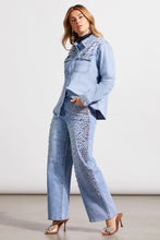 Load image into Gallery viewer, This striking sparkle and shine denim shirt perfectly brings together casual style with glamorous flair, adorned with striking rhinestone details in clear, pink, and red. It boasts a snap-up front, long sleeves with open cuffs, a crisp collar, and practical chest pockets, making it as functional as it is fashionable. 