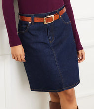 Load image into Gallery viewer, Model wearing a dark blue denim skirt, burgundy top, brown belt and brown knee-high boots against a white backdrop.