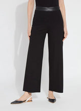 Load image into Gallery viewer, The Denver Hi Waist Wide Leg Ponte pant offers a high waist, welt back pockets and a concealed patented waistband. These pants are constructed without side seams for a lengthening, flattering fit and offer a shiny, lightweight vegan leather waist that contrasts with the rest of the pant, in matte, 4-way stretch Ponte. Machine washable, the Denver Hi Waist Wide Leg Ponte pant also features a raw-edge hem that’s simple to shorten. We love them styled with our matching Denver Ponte Sleeveless Coat. 