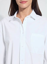 Load image into Gallery viewer, Close up of model wearing a white long sleeve top against a white background.