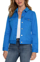 Load image into Gallery viewer, Enhance your wardrobe with a pop of vibrant color by adding this classic Diva Blue jean jacket. This versatile layering piece is made with comfortable fabric that maintains its shape. Perfectly complete any outfit by pairing it with its matching Hannah Crop Flare counterpart for a stylish and contemporary look. Color - Diva blue. Two front flap pockets. Two seam side pockets. 6-button front closure. Silver metal buttons. 23" HPS.