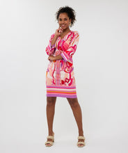 Load image into Gallery viewer, Make a statement with the EsQualo Disco Hit Dress, designed for effortless elegance and bold style. This sleeveless dress features a round neckline and dazzling bead embellishments, adding a touch of glamour to your wardrobe. The multicolored abstract print blends vibrant hues of pink, red, orange, cream and purple creating a playful yet sophisticated look.