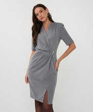 Load image into Gallery viewer, Woman wearing a gray cinched dress with a silver buckle against a white background.