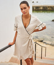 Load image into Gallery viewer, The EsQualo Fancy Contrast Stitch Linen Dress is a chic, breathable linen dress featuring elegant contrast stitching for a stylish touch. Available in Sand, this lightweight, effortless piece is perfect for warm-weather days. Designed for comfort and sophistication, it’s a must-have for a versatile, polished look.