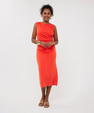 Load image into Gallery viewer, The EsQualo Dress Long Gathering is a stunning statement piece designed for effortless elegance and comfort. Featuring a vibrant red-orange hue, this midi length dress exudes warmth and sophistication, making it perfect for both casual and formal occasions.
