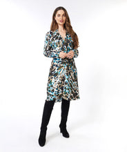 Load image into Gallery viewer, This Dress Twist with Animal Roots Print in bold colors features a feminine front twist detail that gives it a flowy fit, making it an ideal staple in your wardrobe. Whether for a day out or a night of dancing, this piece will add an enchanting print and timeless charm to your ensemble. Color- Peacock blue, navy and olive green. V-Neck. Long sleeve. Collared.