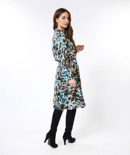 Load image into Gallery viewer, This Dress Twist with Animal Roots Print in bold colors features a feminine front twist detail that gives it a flowy fit, making it an ideal staple in your wardrobe. Whether for a day out or a night of dancing, this piece will add an enchanting print and timeless charm to your ensemble. Color- Peacock blue, navy and olive green. V-Neck. Long sleeve. Collared.