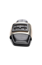 Load image into Gallery viewer, Featuring a black Liverpool Los Angeles logo on a light gold metallic finish, our Dunbar Logo Medallion Sandals add a touch of sophistication to any outfit, making them perfect for both casual and dressy occasions.