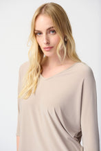 Load image into Gallery viewer, Discover the versatility of this reversible top, featuring a V-shaped neckline on one side and a round collar on the other. Perfect for any occasion, the contemporary design allows for effortless styling. With three-quarter dolman sleeves for added elegance and a relaxed fit, this top is both comfortable and chic.