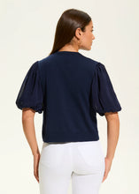 Load image into Gallery viewer, The FDJ French Dressing Eliana Elbow Sleeve Cardigan is a lightweight, stylish layer designed for effortless elegance. Featuring delicate puff short sleeves, a round neckline, and a delicate hook-and-eye closure, this cardigan offers a flattering silhouette that complements any outfit.