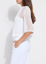 Load image into Gallery viewer, The Elera Linen Mesh Cardigan is your go-to layer for effortless style. Light and breathable, this off-white beauty is perfect for casual days and dressier moments alike. Its airy linen mesh fabric keeps things cool while adding a subtle touch of texture.