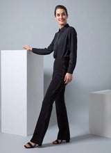 Load image into Gallery viewer, Crafted from 4-way stretch Ponte, the Elysse Embellished Crystal Pant boasts an elegant fit-and-flare leg, expertly skimming the hips and thighs. The sparkling rhinestones lining the waist to hem add a touch of glamour to these timeless black bottoms. Features include a patented concealed waistband, easy pull-on styling, and a blind hem for simple alterations.