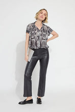 Load image into Gallery viewer, Skimming the hips and thighs before flaring out into a fit-and-flare leg, these all-season, lightweight pants are perfect with tucked-in blouses, heeled mules, and cropped jackets. Made from Lyssé's unique 4-way stretch Foiled Vegan Leather and featuring a concealed patented 360° smoothing waistband, the timeless Elysse Pant includes welt pockets, a clean front, and an adjustable raw-edge hem. Lyssé Fit™ 