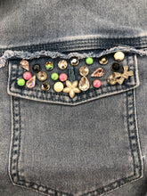 Load image into Gallery viewer, There's really no need to wear jewelry when you wear this fabulous denim shacket. The classic denim shacket gets a refreshing update this season with eye-catching rhinestone embellishments in all sorts of colors and shapes meticulously set on the collar and pockets. Wear this statement piece and be prepared to get noticed!