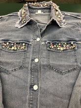 Load image into Gallery viewer, There's really no need to wear jewelry when you wear this fabulous denim shacket. The classic denim shacket gets a refreshing update this season with eye-catching rhinestone embellishments in all sorts of colors and shapes meticulously set on the collar and pockets. Wear this statement piece and be prepared to get noticed!