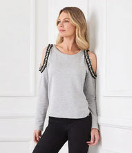 Load image into Gallery viewer, This cold-shoulder sweatshirt, masterfully crafted with detailed pearl adornments set against a backdrop of black, metallic gold, and cream tweed, brings an elegant flair to any ensemble. Perfect for errands or a relaxed evening, it provides an ideal mix of comfort and chic.