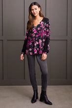 Load image into Gallery viewer, Radiate confidence both inside and out with this vibrantly patterned blouse, featuring a flowing fit that flatters and provides comfort. Distinctive touches such as ladder stitching on the yoke and the embroidered long sleeves distinguish it from the ordinary. Stand out in a crowd with this eye-catching style.