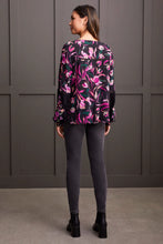 Load image into Gallery viewer, Radiate confidence both inside and out with this vibrantly patterned blouse, featuring a flowing fit that flatters and provides comfort. Distinctive touches such as ladder stitching on the yoke and the embroidered long sleeves distinguish it from the ordinary. Stand out in a crowd with this eye-catching style.