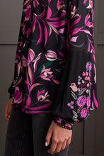 Load image into Gallery viewer, Radiate confidence both inside and out with this vibrantly patterned blouse, featuring a flowing fit that flatters and provides comfort. Distinctive touches such as ladder stitching on the yoke and the embroidered long sleeves distinguish it from the ordinary. Stand out in a crowd with this eye-catching style.