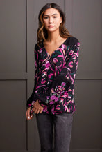 Load image into Gallery viewer, Radiate confidence both inside and out with this vibrantly patterned blouse, featuring a flowing fit that flatters and provides comfort. Distinctive touches such as ladder stitching on the yoke and the embroidered long sleeves distinguish it from the ordinary. Stand out in a crowd with this eye-catching style.