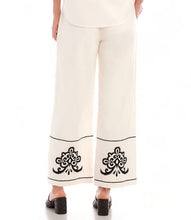 Load image into Gallery viewer, Redefine casual sophistication with the Karen Kane Embroidered Drawstring Ankle Pants. Featuring a timeless design and intricate embroidery, these pants bring a touch of refinement to your everyday wardrobe. The comfortable drawstring waist, functional pockets, and airy wide-leg fit make them as practical as they are stylish. Perfect for adding a chic twist to any look, from relaxed afternoons to polished evenings.