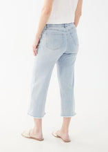 Load image into Gallery viewer, Experience the perfect combination of comfort and style with these French Dressing denim jeans. Designed for optimal ease and fashion, they boast a pull-on design and delicate pastel flowers on the front legs that beautifully complement the light wash blue. Color - Sky blue. Embroidered pastel flowers. Non-functional pockets.