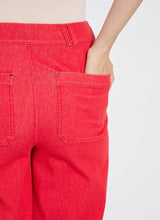 Load image into Gallery viewer, Elevate your wardrobe with the Lysse Erin Pintuck Reprieve Denim, designed for effortless style and all-day comfort. Featuring a 27-inch inseam, this sleek pant offers a flattering fit with a touch of sophistication. The pintuck detailing adds a refined edge, while the striking red hue makes a bold statement.
