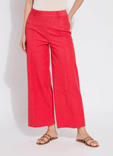 Load image into Gallery viewer, Elevate your wardrobe with the Lysse Erin Pintuck Reprieve Denim, designed for effortless style and all-day comfort. Featuring a 27-inch inseam, this sleek pant offers a flattering fit with a touch of sophistication. The pintuck detailing adds a refined edge, while the striking red hue makes a bold statement.