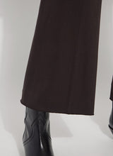 Load image into Gallery viewer, Crafted from 4-way stretch Knit Denim, these jeans boast a high-waisted, wide-leg cut with a concealed patented waistband, back patch pockets adorned with gunmetal studs, belt loops, and topstitching. The Erin High Waist Wide Leg Denim offers an extra-wide leg without side seams, presenting a cropped, ankle-length design with a raw-edge hem that can be easily shortened.