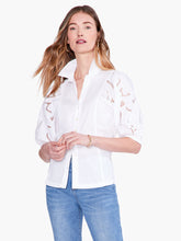 Load image into Gallery viewer, An embroidered top loaded with detail, this shirt is a must-have for casual denim looks and elevated outfits alike. Signature embroidery details and negative space on the puff sleeves add texture and interest to your look. Elastic at the short sleeve openings add extra shape. Wear it with the collar popped to add some attitude. With a classic button front and a hem designed to sit at the hip. Color- Paper white. Regular fit. Shirt collar. Short sleeve.