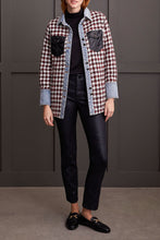 Load image into Gallery viewer, The Fantasia Shacket offers a chic update to your autumn collection. Showcasing a classic plaid design in a striking mix of red, black, and white, it boasts eye-catching accents with denim cuffs and collar, along with faux leather pockets secured by fancy buttons. Ideal for the brisk weather, this shacket promises to keep you warm and fashionable.