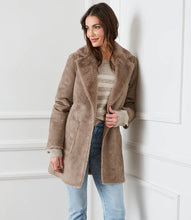 Load image into Gallery viewer, A fold over collar shows off the cozy faux-fur lining of this polished coat that is outfitted with patch pockets for even more warmth. Color- Taupe. Patch pockets. Button down. Faux fur. Fabric- 100% Polyester. Care- Dry clean.